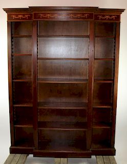Mahogany open bookcase with ribbon detail