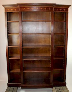 Mahogany open bookcase with ribbon detail