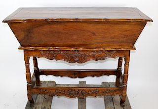 French Provincial petrin in carved walnut