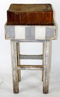 Antique butcher block on painted stand