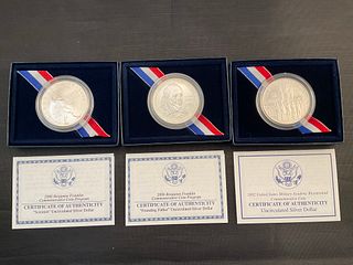 Group of Three US Mint Uncirculated Commemorative 0.900 Silver Dollars 