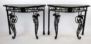 Pair of black iron consoles with grape motif and black