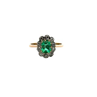 Antique halo Ring in 18k Gold with Emerald and Diamonds