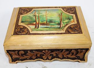 Carved wooden box with painted scene