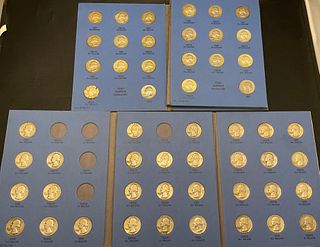 Group of 51 Washington Silver Quarters and 12 Clad Quarters in Coin Folders