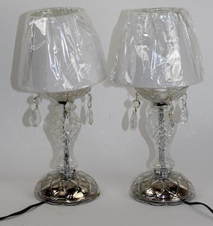 Pair of small cut glass lamps