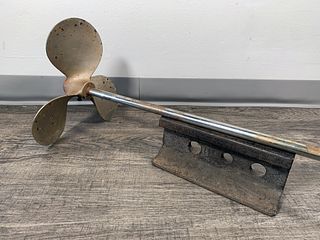 BOAT PROPELLER AND PIECE OF RAIL