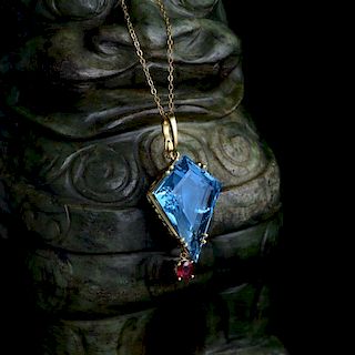 An Exceptional 54.68-Carat Aquamarine and Ruby Pendant