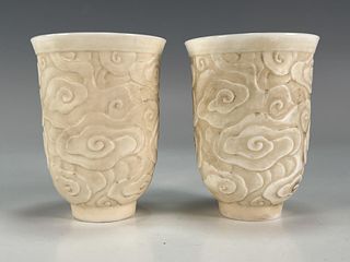 TWO WHITE PORCELAIN TEA CUPS WITH LINGZHI SHAPES