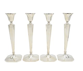 Cartier Set of Four Sterling Silver Candlesticks