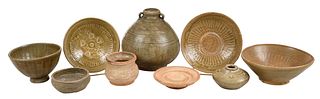 Nine Asian Brown Glazed Pottery Vessels