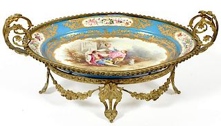 FRENCH PORCELAIN AND GILT METAL CENTERPIECE