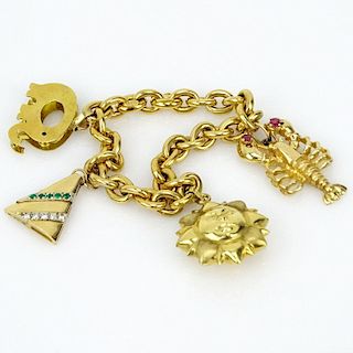 Vintage Italian 18 Karat Yellow Gold Charm Bracelet with One (1) 18 Karat Yellow Gold Charm (elephant) and Three (3) 14 Karat