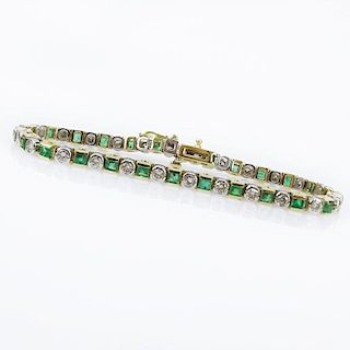 2.10 Carat Round Brilliant Cut Diamond, 2.50Carat Square Cut Emerald and 14 Karat Yellow and White Gold Line Bracelet.