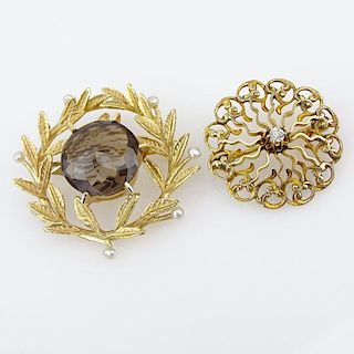 Vintage 14 Karat Yellow Gold and Small Round Cut Diamond Brooch together with a 14 Karat yellow Gold, Topaz and Seed Pearl Pe