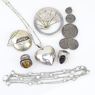 Seven (7) Piece Sterling Silver Jewelry Lot Including: One Necklace with Moonstones; A Necklace with Heart Pendant; A Modern 
