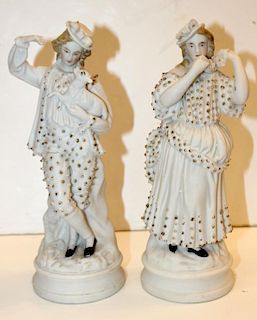Pair of porcelain male and female figurines