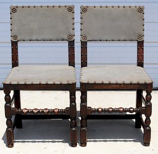 Pair of Jacobean leather upholstered side chairs