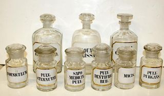 Lot of 9 glass apothecary bottles