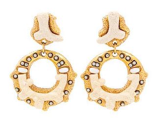 A Pair of Kalinger Goldtone and White Coral Motif Earclips, 3.5" x 2.5".