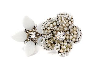 A Miriam Haskell White Bead and Rhinestone Floral Brooch, 2.5" x 1.5".