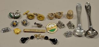 Group lot to include pair of 14K earrings and tie clip along with silver earrings, two salt spoons, and miscellaneous. 15.7 g