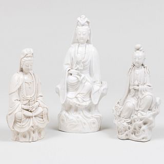 Three Chinese White Glazed Porcelain Figures of Guanyin