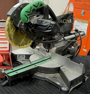 Hitachi portable compound mitre saw with 9 inch blade.