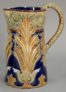 Doulton Lambeth stoneware pitcher by Mark Marshall having heavy glaze over molded leaf décor. 
height 9 1/2 inches