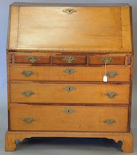 Chippendale maple and tiger maple slant front desk with pinwheel carved interior, 18th century (restored). ht. 42in., wd. 38i