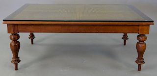 Plantation style coffee table with caned top and fitted glass. ht. 18in., top: 36" x 48"