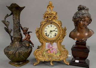 Three piece lot to include Ansonia gilt metal rococo mantel clock with porcelain painted plaque (ht. 14 1/2in.), a white meta