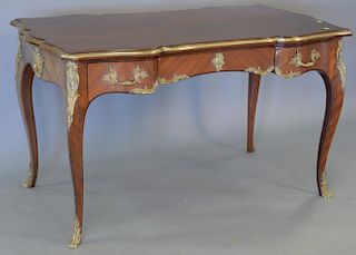 Louis XV style shaped top writing table with three drawers and brass mounts (sun faded on one side). ht. 30in., top: 31" x 53