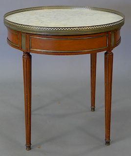 Louis XVI style marble top table with gallery and one drawer. ht. 29in., dia. 28in.