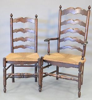 Seven piece lot to include a set of six ladderback chairs with rush seats and a maple ladderback chair.