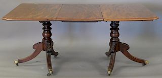 Continental mahogany double pedestal dining table with two 20" leaves. ht. 29in., top closed: 43" x 46", top open: 43" x 86"