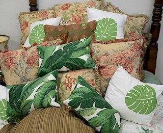 Twenty-two miscellaneous throw pillows along with custom bed skirt.