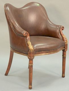 Leather upholstered armchair.
