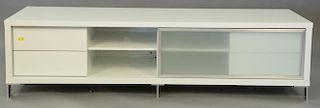 Contemporary tv stand with sliding glass door. ht. 20in., wd. 70in., dp. 23in.