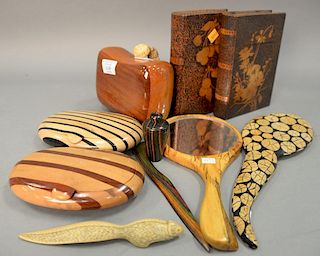 Group lot with two Pyrography faux leather book boxes (ht. 7 1/2in., wd. 5 1/2in.) and a group of eight carved and inlaid woo