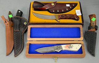 Five buck knives including Winchester DH Russell belt knife with leather sheath and original box, Estes Park Colorado Dill bu