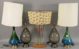 Group of six Mid-Century lamps to include two pairs of table lamps, a brass modern table lamp, and a pole floor lamp.