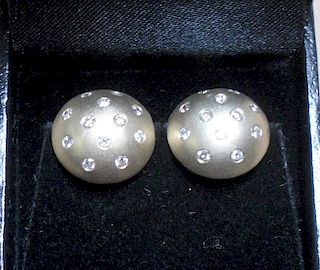 Diamond Button-style Earrings.