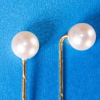TWO PEARL STICK PINS