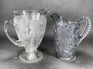 PAIR OF GLASS PITCHERS 