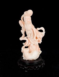 A Chinese Coral Figure of Guanyin