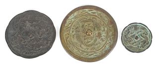 Three Early Chinese Bronze Hand Mirrors