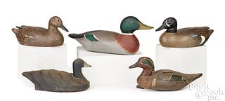 Five carved and painted duck decoys