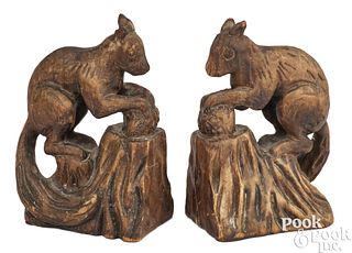 Pair of carved squirrels with nuts, early 20th c.