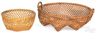 Two delicate woven cheese baskets